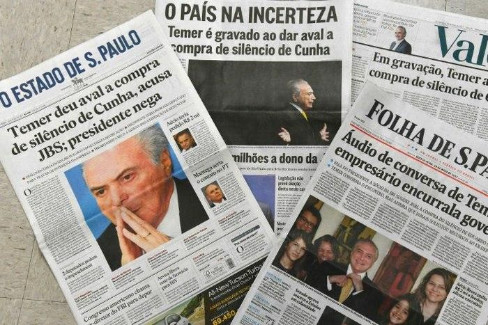 A view of the front pages of the main Brazilian newspapers, reporting on a scandal implicating Brazilian President Michel Temer and Senator Aecio Neves, in Sao Paulo, Brazil on May 18, 2017