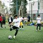 Going for goal: Jawad Ahmadi takes a penalty kick during a tournament with teams composed of refugees and European volunteers in Athens