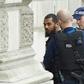 Firearms officers from the British police detain a man on Whitehall near the Houses of Parliament in central London on April 27, 2017