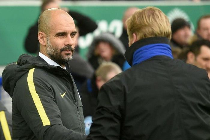 Manchester City manager Pep Guardiola (left) greets Everton boss Ronald Koeman ahead of their Premier League clash at Goodison Park on January 15, 2017