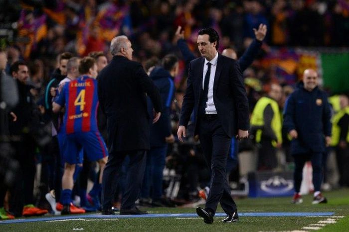 Paris Saint-Germain's head coach Unai Emery (R), seen on the sideline during their UEFA Champions League round of 16 2nd leg match against Barcelona, at Camp Nou stadium in Barcelona, on March 8, 2017