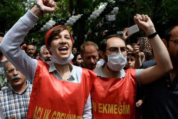Turkish primary school teacher Semih Ozakca (R) and academic Nuriye Gulmen have been surviving on water alone