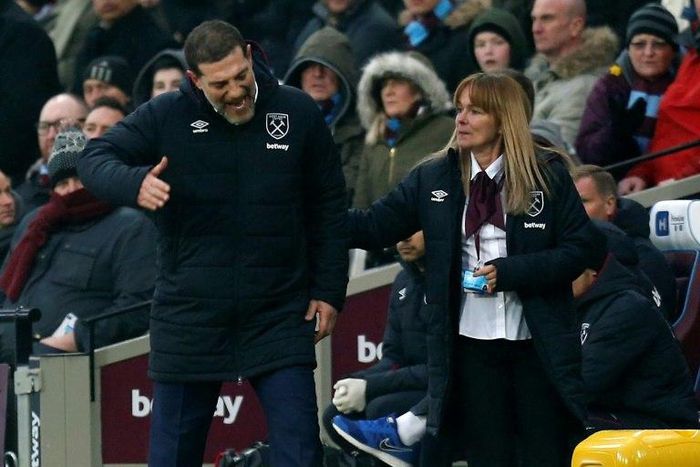 West Ham United's Croatian manager Slaven Bilic (L) is escorted to the tunnel during the English Premier League football match between West Ham United and West Bromwich Albion at The London Stadium, in east London on February 11, 2017