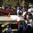 Thousands of indigenous Guatemalans accompany to the cemetery the coffins of two children killed by their kidnappers in the Cerro Alto village in San Juan Sacatepequez, 45km west of Guatemala city on February 14, 2017