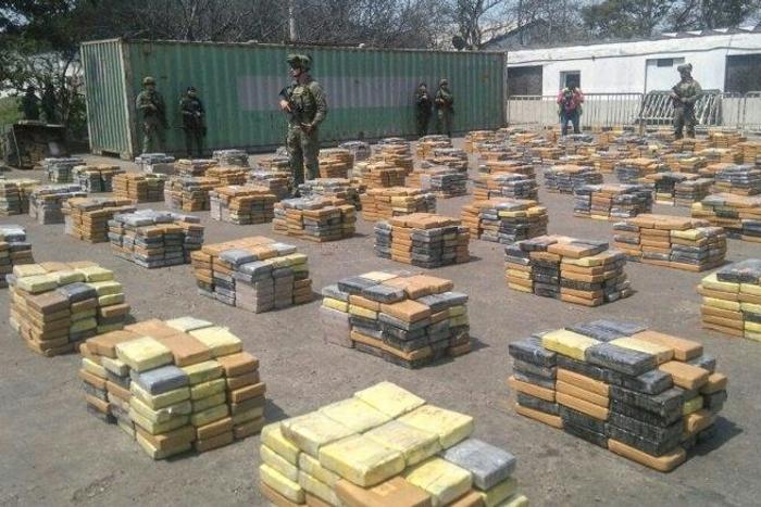 This handout picture released by the Colombian Antinarcotics Police shows 6,184 kilos of cocaine -which was heading to the port of Algeciras, Spain- seized in Barranquilla, on April 2, 2017