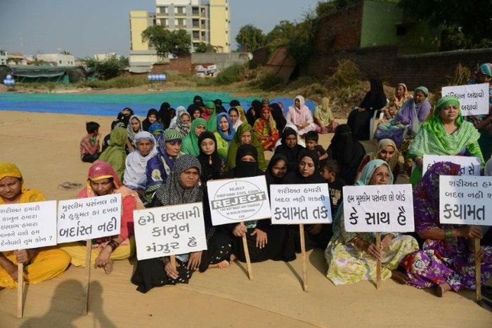 Indian Muslim women participate in a rally to oppose the Uniform Civil Code that would outlaw the practice of "triple talaq" in Ahmedabad in 2026