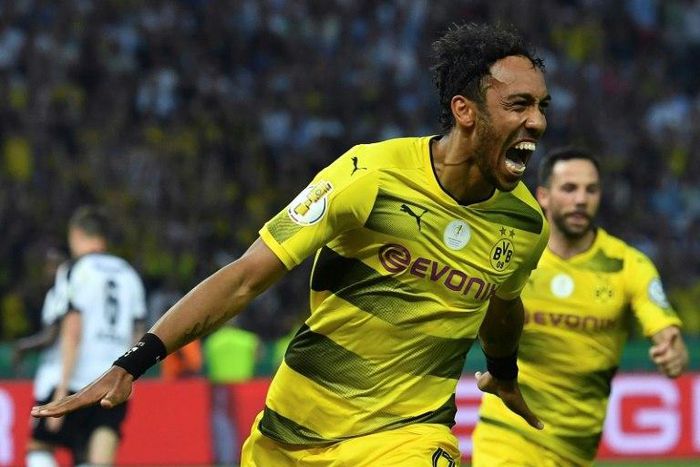 Dortmund's Pierre-Emerick Aubameyang celebrates scoring a penalty against Eintracht Frankfurt during their German Cup final at the Olympic stadium in Berlin on May 27, 2017