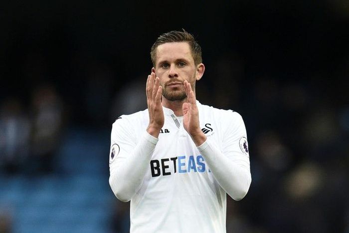 Icelandic midfielder Gylfi Sigurdsson, pictured in February 2017, has left Swansea for rival club Everton, signing a five-year contract reportedly worth £100,000 a week, Everton's record signing deal