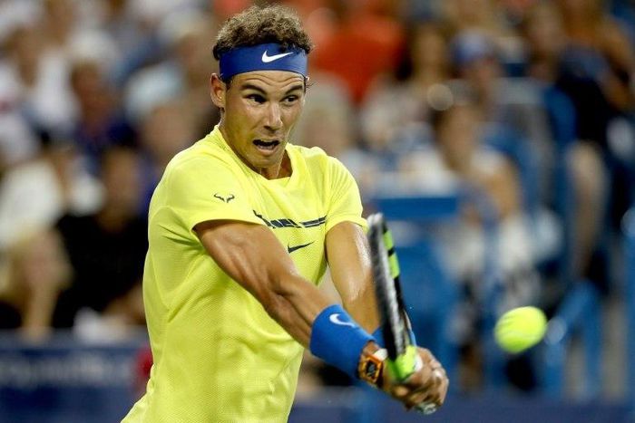 Rafael Nadal of Spain returns a shot to Richard Gasquet of France at the Western & Southern Open in Mason, Ohio