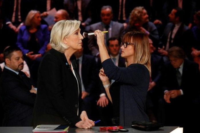 Marine Le Pen, seen here being made up before a French TV debate, has visited Moscow on many occasions and enjoys positive coverage in Russian state media