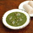 Molokhia cooked in lamb meat, ready to eat, with Injera.