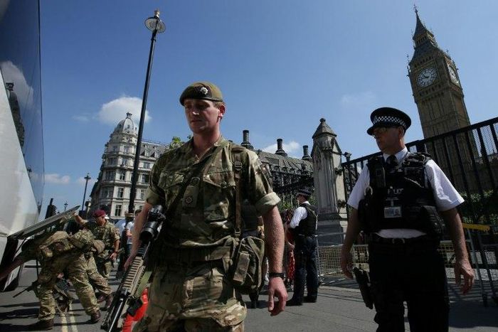 Troops and armed police are patrolling the streets, a rare sight in Britain
