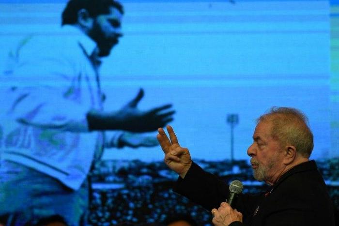 Brazil's former president Luiz Inacio Lula Da Silva fires up his Workers Party (PT) faithful, pledging they will regain power next year