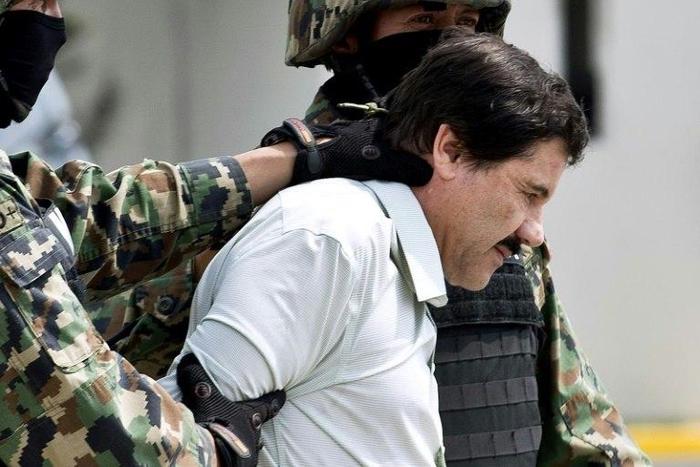 Mexican drug trafficker Joaquin Guzman Loera aka "el Chapo Guzman" escorted by marines in Mexico City