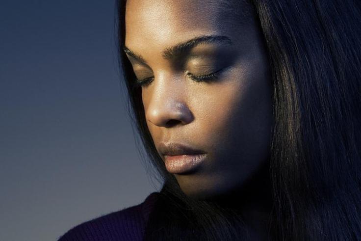 African woman with a sad facial expression