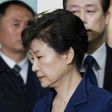 South Korea's ousted president Park Geun-Hye (front) arrives for questioning on her arrest warrant at the Seoul Central District Court in Seoul on March 30, 2017