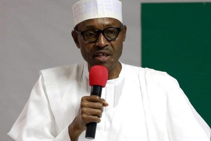 President Muhammadu Buhari addresses members of the National Working Committee during the meeting of the All Progressives Congress (APC) party at the headquarters of the party in Abuja, Nigeria July 3, 2015.  REUTERS/Afolabi Sotunde