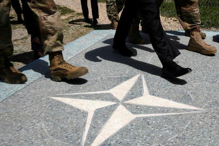 US-led NATO suspended all practical cooperation with Russia over its role in Ukraine but kept political channels of communication open