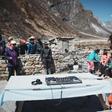 Influential British DJ Paul Oakenfold has reached Mount Everest's base camp where he plans to host the "highest party on earth", performing a set at 5,380 metres (17,600 feet)