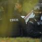 Indonesian national Siti Aisyah, one of the two acused, is taken into court with a Malaysian police escort