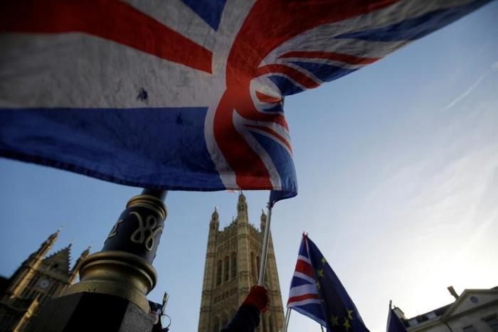 Prime Minister Theresa May says that if parliament backs her Brexit deal, 'Britain can turn a corner'
