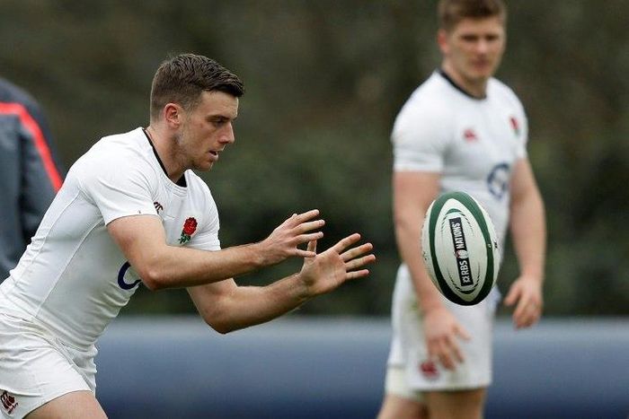 England's centre Owen Farrell (R) watches fly-half George Ford during a team training session at Pennyhill Park in Bagshot, on March 16, 2017