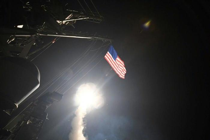 The guided-missile destroyer USS Porter launches Tomahawk missiles during military operations in the Mediterranean Sea, April 7, 2017