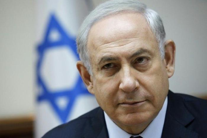 Israeli Prime Minister Benjamin Netanyahu attends the weekly cabinet meeting at his office in Jerusalem on July 30, 2017.