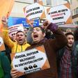 Participants hold placards reading, "Free press can't be silenced" (C) outside the office of Turkish newspaper Cumhuriyet in Ankara in 2016