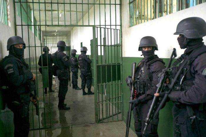 Special Operations Command personnel keep watch during a visit to the Anísio Jobim Penitentiary Complex, where 56 inmates were killed during a riot two weeks ago, in Manaus, Brazil, on January 14, 2017