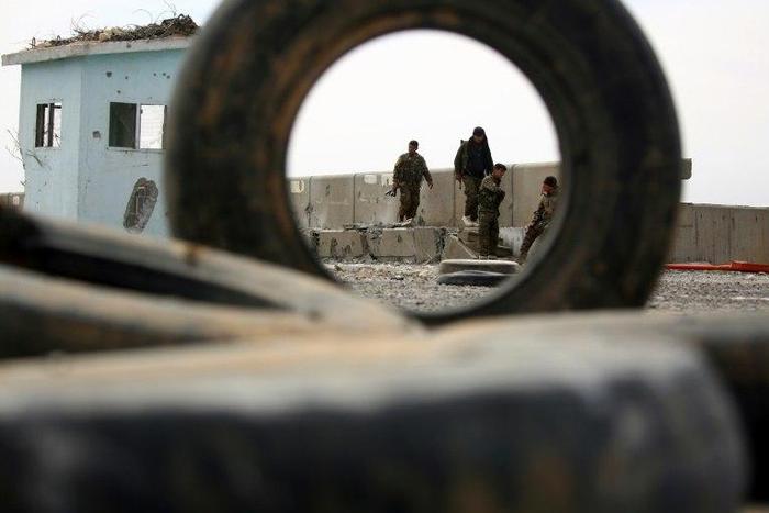 Members of the US-backed Syrian Democratic Forces inspect a dam recently recaptured from jihadists near Raqa on March 27, 2017