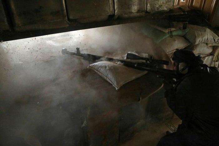 Fighters from Jaish al-Islam are pictured on February 21, 2017, in Syria's rebel-held area of Harasta, on the northeastern outskirts of Damascus