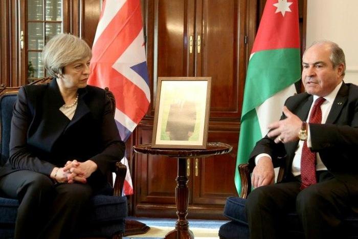 British Prime Minister Theresa May meets Jordanian Prime Minister Hani Mulqi in Amman on April 3, 2017