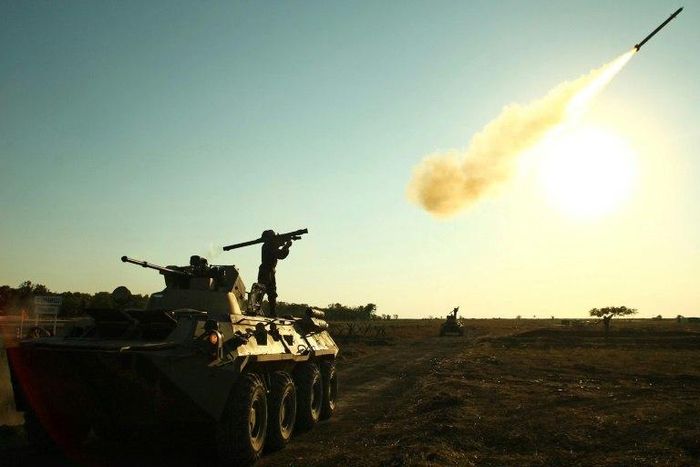 A soldier fires a portable air defense rocket during international war games Russia hosted in 2015.