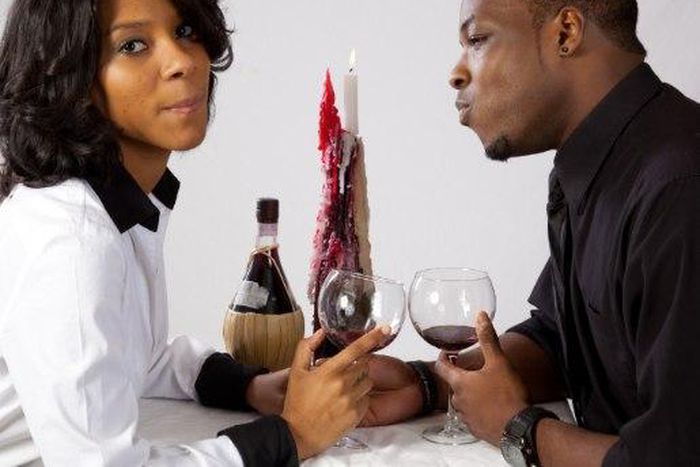 Lovers looking uncomfortable with each other [Source: Madamenoire]