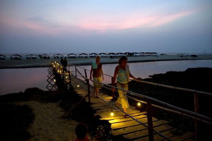 Tourists pictured on Goa's Mandrem Beach