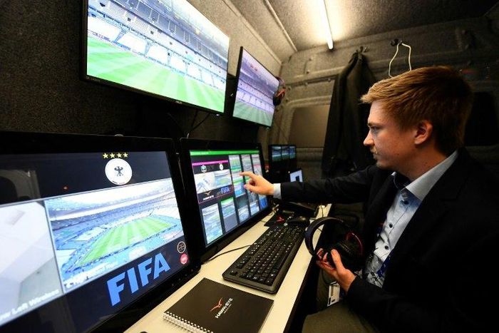 A technician checks the video arbitration system that will be used during the friendly football match France vs Spain on March 28, 2017 at the Stade de France stadium in Saint-Denis, north of Paris