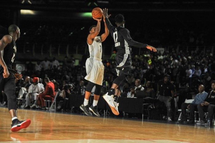 NBA player Kyle Lowry (L) shoots during the NBA Africa Game 2017 basketball match between Team Africa and Team World on August 5, 2017 in Johannesburg