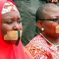 Oby Ezekwesili (R) with another member of the Bring Back Our Girls (BBOG) group during a silent protest on August 30, 2016.