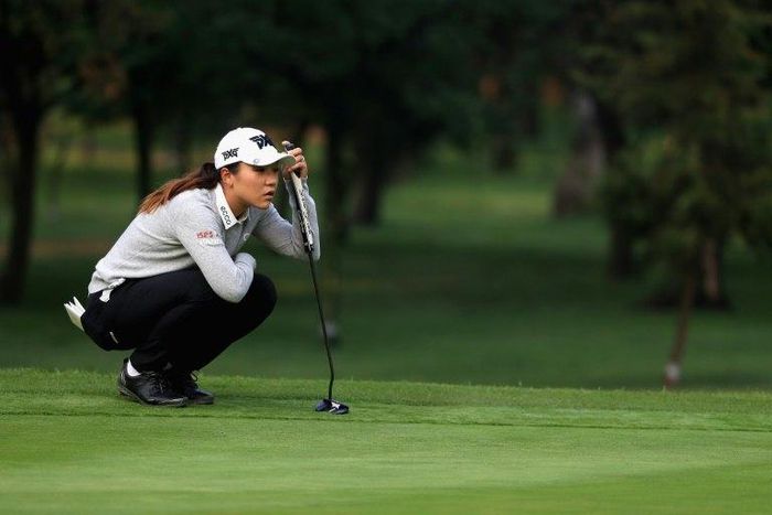 Lydia Ko of New Zealand lines up a putt on the second hole during the first round of the Lorena Ochoa Match Play in Mexico City