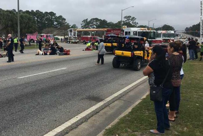Emergency crews respond to the scene of the parade, which was canceled