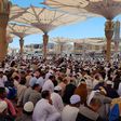 Muslims listening to khutbah