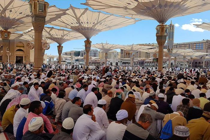 Muslims listening to khutbah