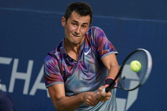 Australia's Bernard Tomic returns the ball to Luxemburg's Gilles Muller on August 28, 2017