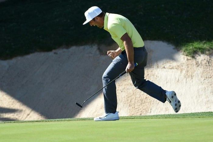 Kevin Chappell celebrates after putting in to win on the 18th green during the final round of the Valero Texas Open on April 23, 2017