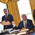 In February, US President Donald Trump (2nd L) and Intel CEO Brian Krzanich (L) met in the Oval Office -- this week, Krzanich left his advisory panel on manufacturing