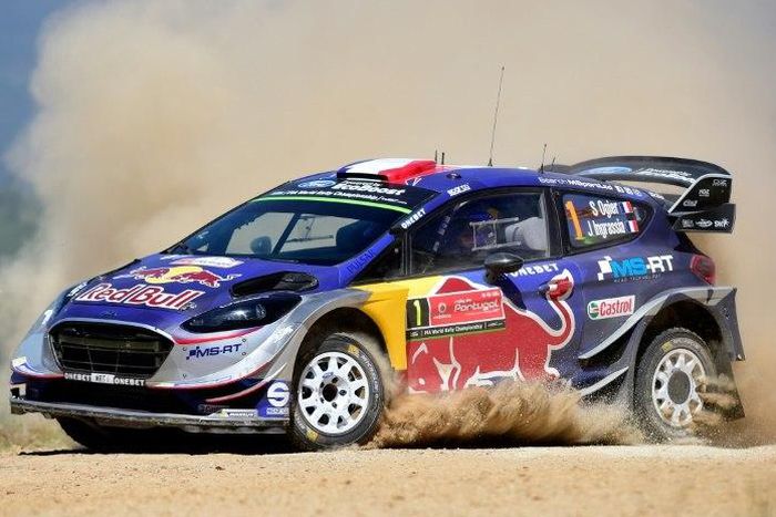 French driver and co-driver, Sebastien Ogier and Julien Ingrassia, steer their Ford Fiesta WRC in Amarante, northern Portugal, on May 20, 2017, during the SS12 stage of the Portugal WCR rally