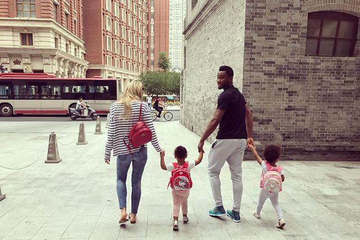 Mikel Obi with his partner Olga Diyachenko  and their twin
