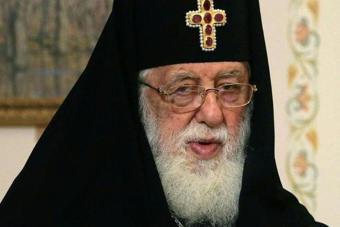 A priest has been arrested on his way to visit Patriarch Ilia II (pictured)