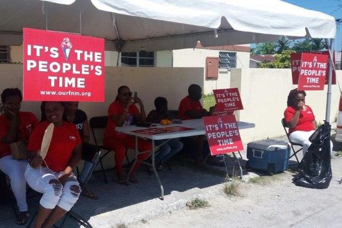 About 180,000 people are registered to cast votes in the Bahamas' election. Supporters of the Free National Movement (FNM) are shown here gathered at a polling station in Nassau